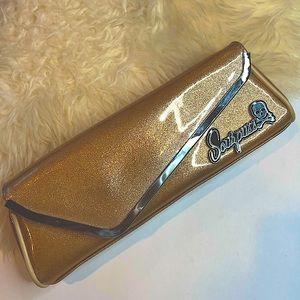 Sourpuss clutch in gold glitter
